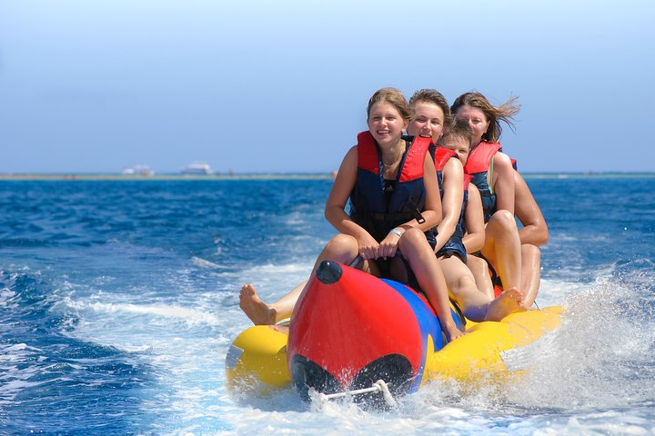 Experience the excitement of racing over waves on a banana or donut ride surrounded by the stunning views of JBR skyline and the iconic Dubai Eye. Perfect for friends and family!